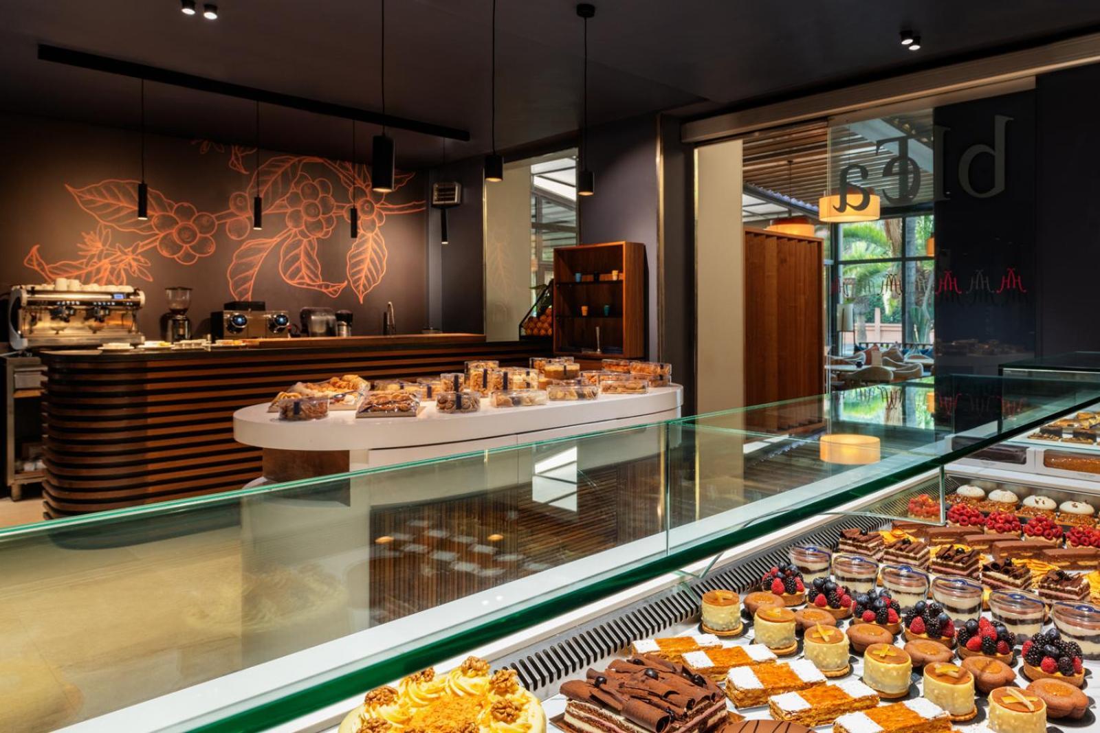 Hivernage Hotel & Spa Marrakesz Zewnętrze zdjęcie The interior of a Starbucks Reserve store in Milan, Italy